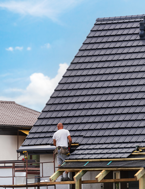 Thiago's Roofing contractors working on a roof Thiago's Roofing contractors working on a roof